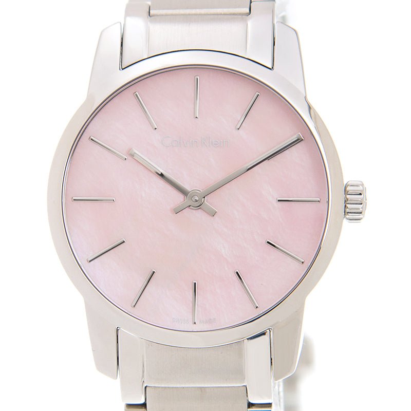 Angled view of Calvin Klein City watch showing mother-of-pearl dial and metal strap detail