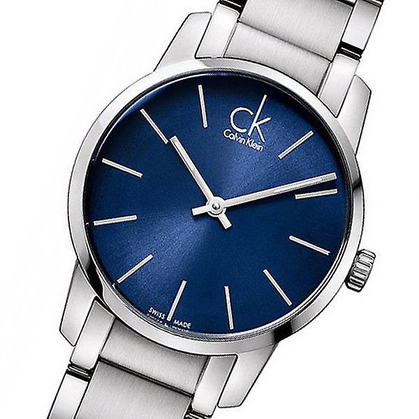 Close-up of Calvin Klein City blue sunburst dial with silver hour markers and hands