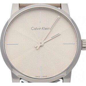Close-up of Calvin Klein City watch beige dial with textured finish and minimalist design