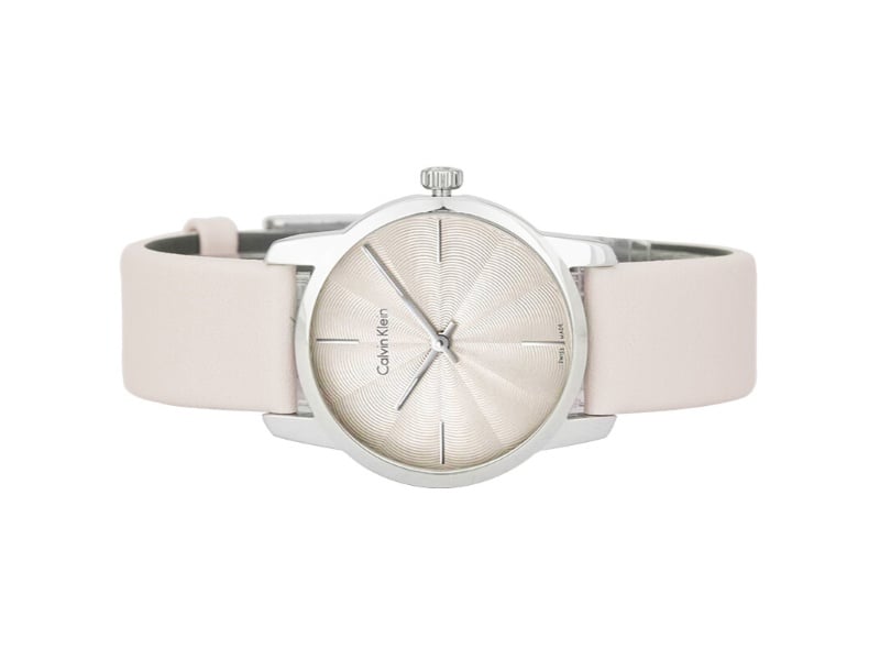 Calvin Klein City ladies watch on wrist with beige strap and silver case