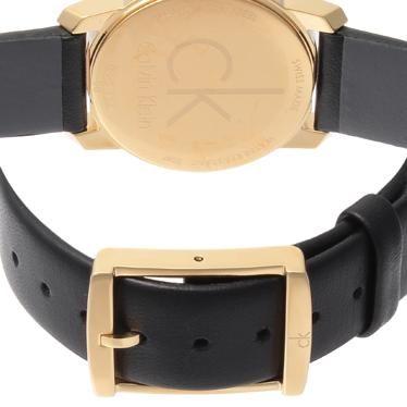 Calvin Klein City watch black leather strap with gold-tone buckle detail