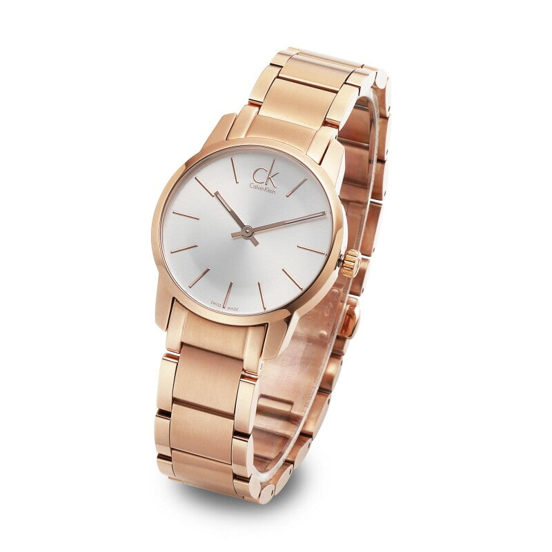 Calvin Klein City K2G23646 ladies watch on wrist showing silver dial and rose gold bracelet