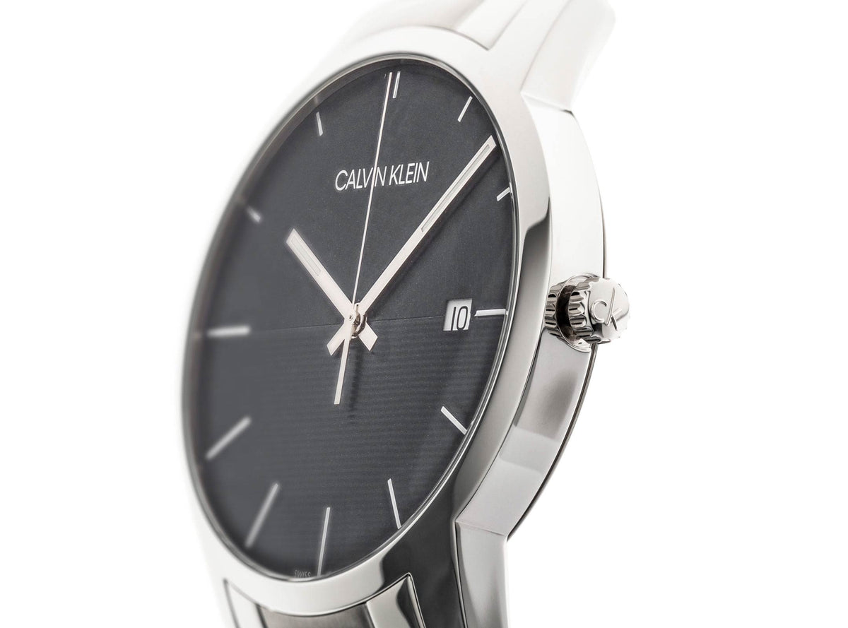 Side angle view of Calvin Klein City watch showing black dial and crown