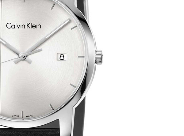 Detailed view of Calvin Klein City dial with date window and steel hands