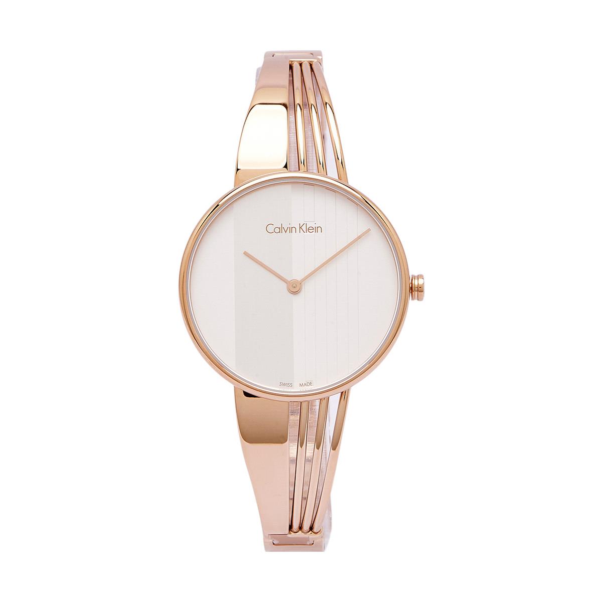 Side angle view of Calvin Klein Drift watch with segmented rose gold-tone bangle strap