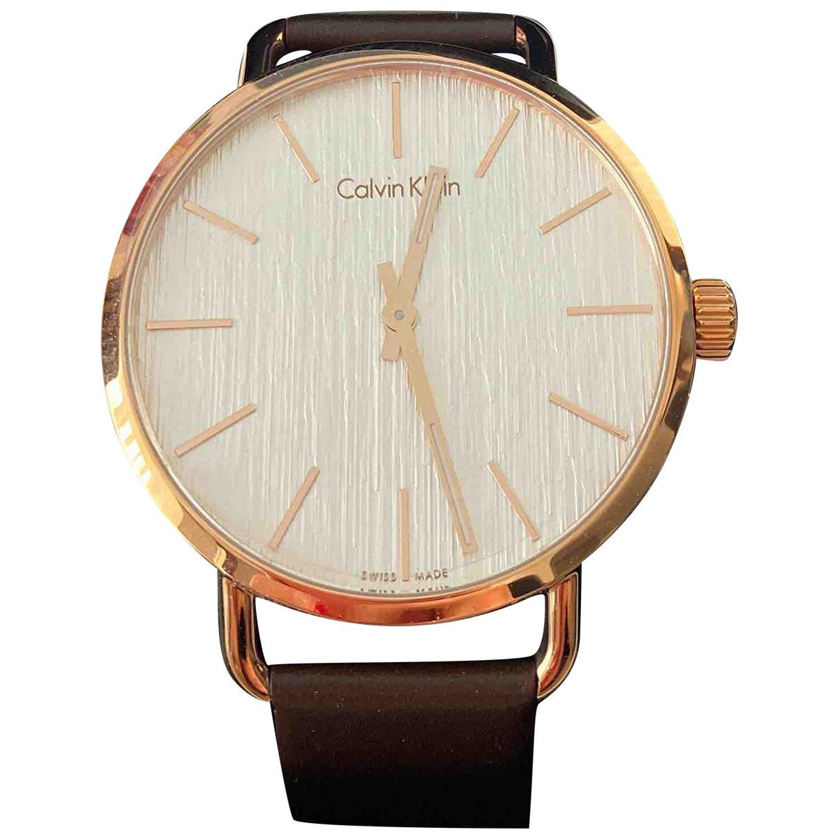 Calvin Klein Even watch dial detail showing silver face with rose gold hour markers