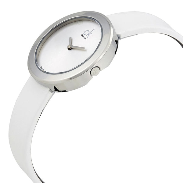 Calvin Klein Firm watch on wrist showing silver case and white strap