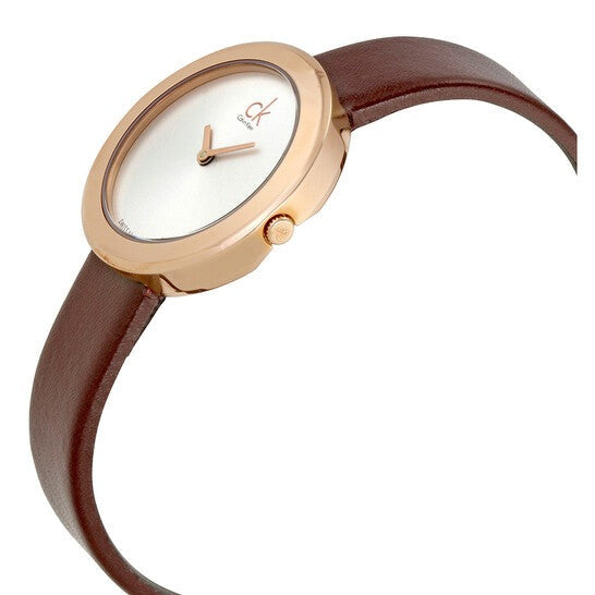 Side view of Calvin Klein Firm watch showing rose gold case profile and leather strap