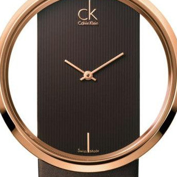 Close-up of transparent dial with rose gold hands, CK logo, and hour markers