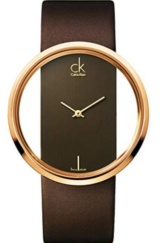 Calvin Klein Glam women's watch with transparent dial, rose gold case, and brown leather strap