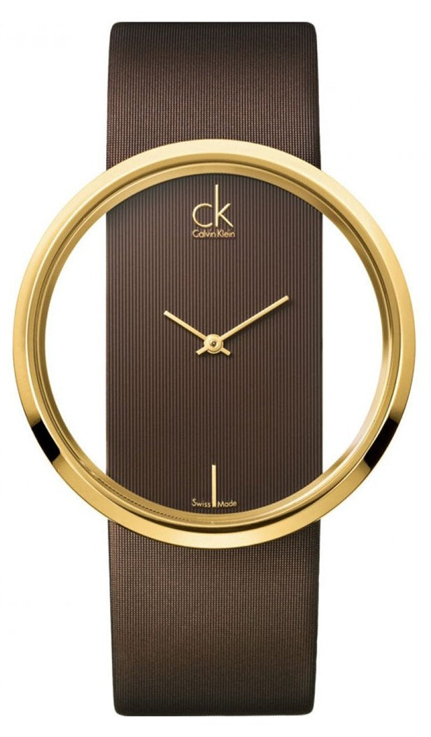 Calvin Klein Glam watch with transparent brown dial, gold case, and brown leather strap