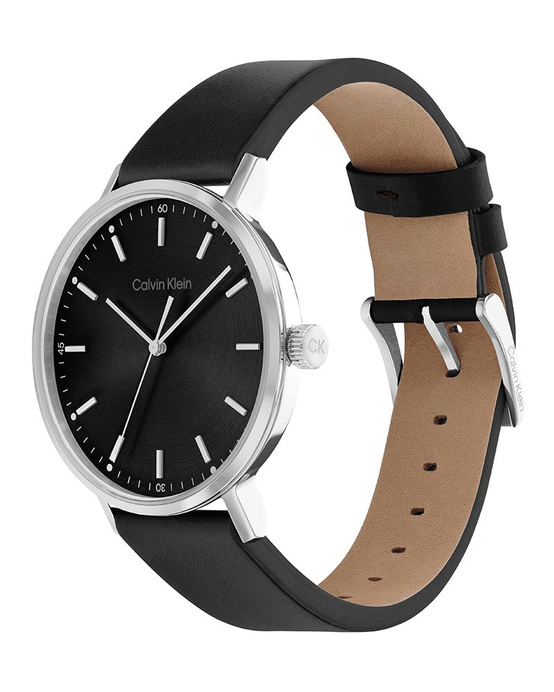 Side profile of Calvin Klein High Noon watch showing black leather strap and case thickness