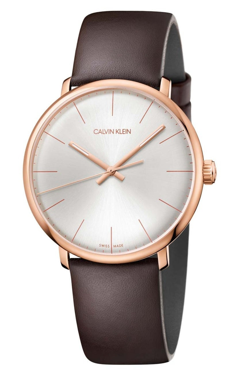 Calvin Klein High Noon quartz watch with silver dial, rose gold case, and brown leather strap