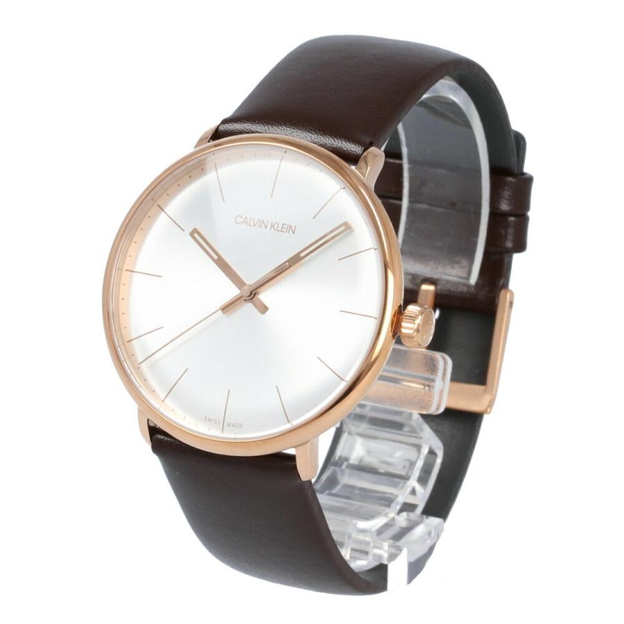 Calvin Klein High Noon watch displayed at angle showing rose gold case and brown leather strap