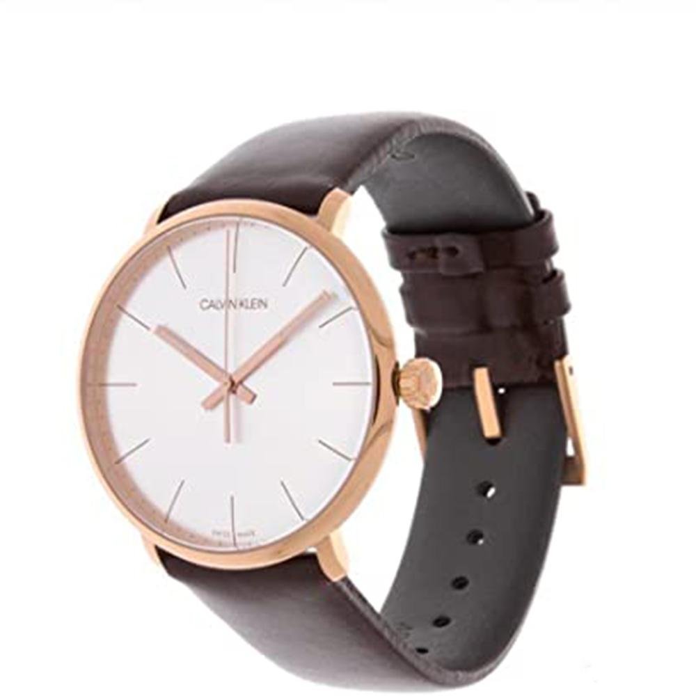 Calvin Klein High Noon men's watch with rose gold case, silver dial, and brown leather strap