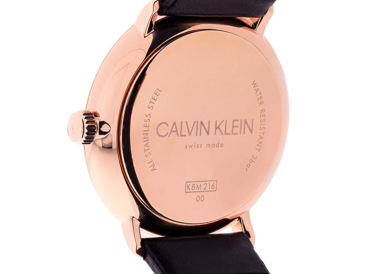 Calvin Klein High Noon watch caseback showing rose gold case back with Swiss made marking and K8M216G6