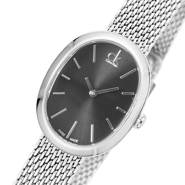 Calvin Klein Incentive oval watch on wrist with silver mesh strap