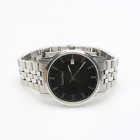 Top-down view of Calvin Klein Infinity black dial automatic watch with steel bracelet