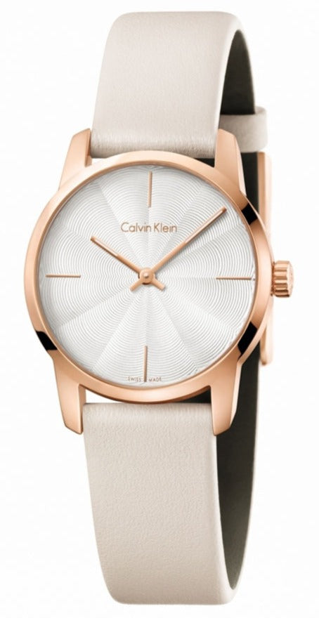 Calvin Klein City quartz watch with silver dial, rose gold case, and white strap