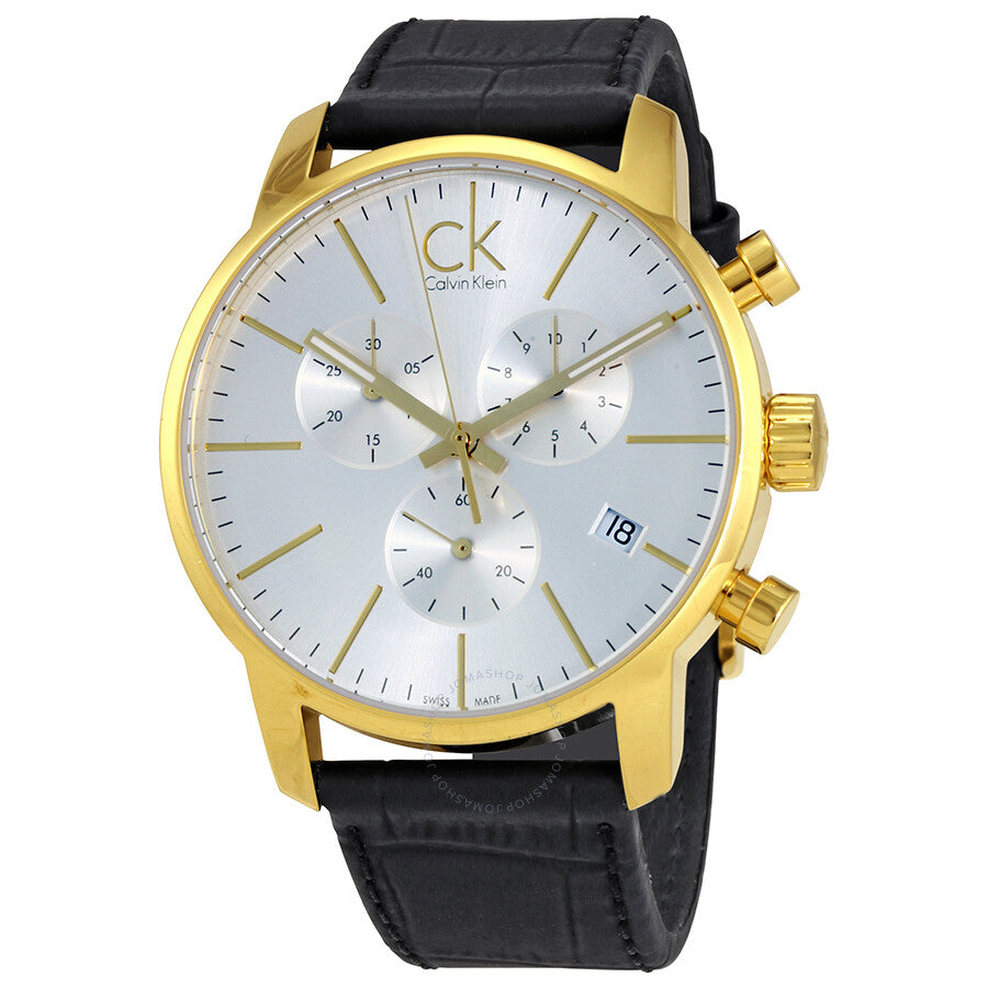 Calvin Klein City chronograph watch showing gold case, silver dial, and black leather strap
