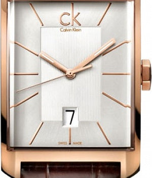 Close-up of Calvin Klein Window watch dial showing silver face with rose gold hands and indices