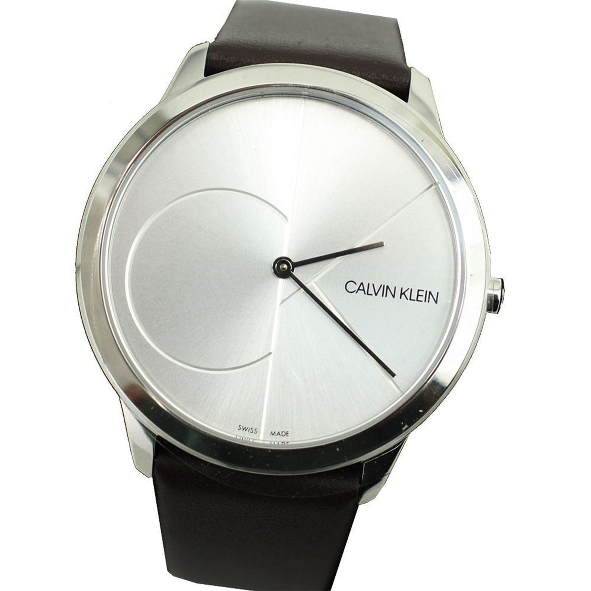 Close-up detail of Calvin Klein watch dial with geometric indices