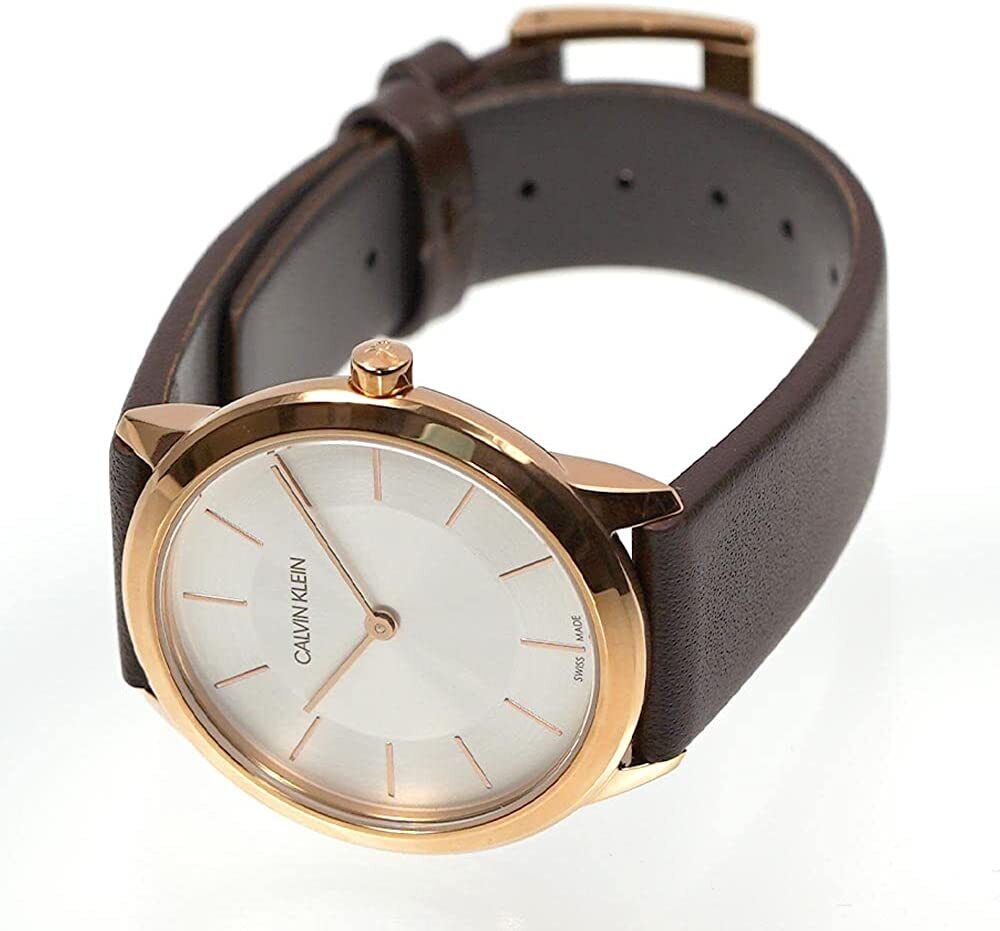 Calvin Klein Minimal watch worn on wrist, showing silver dial and rose gold case