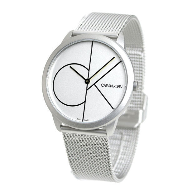 Calvin Klein Minimal watch on wrist displaying white minimalist dial with black hands and mesh strap