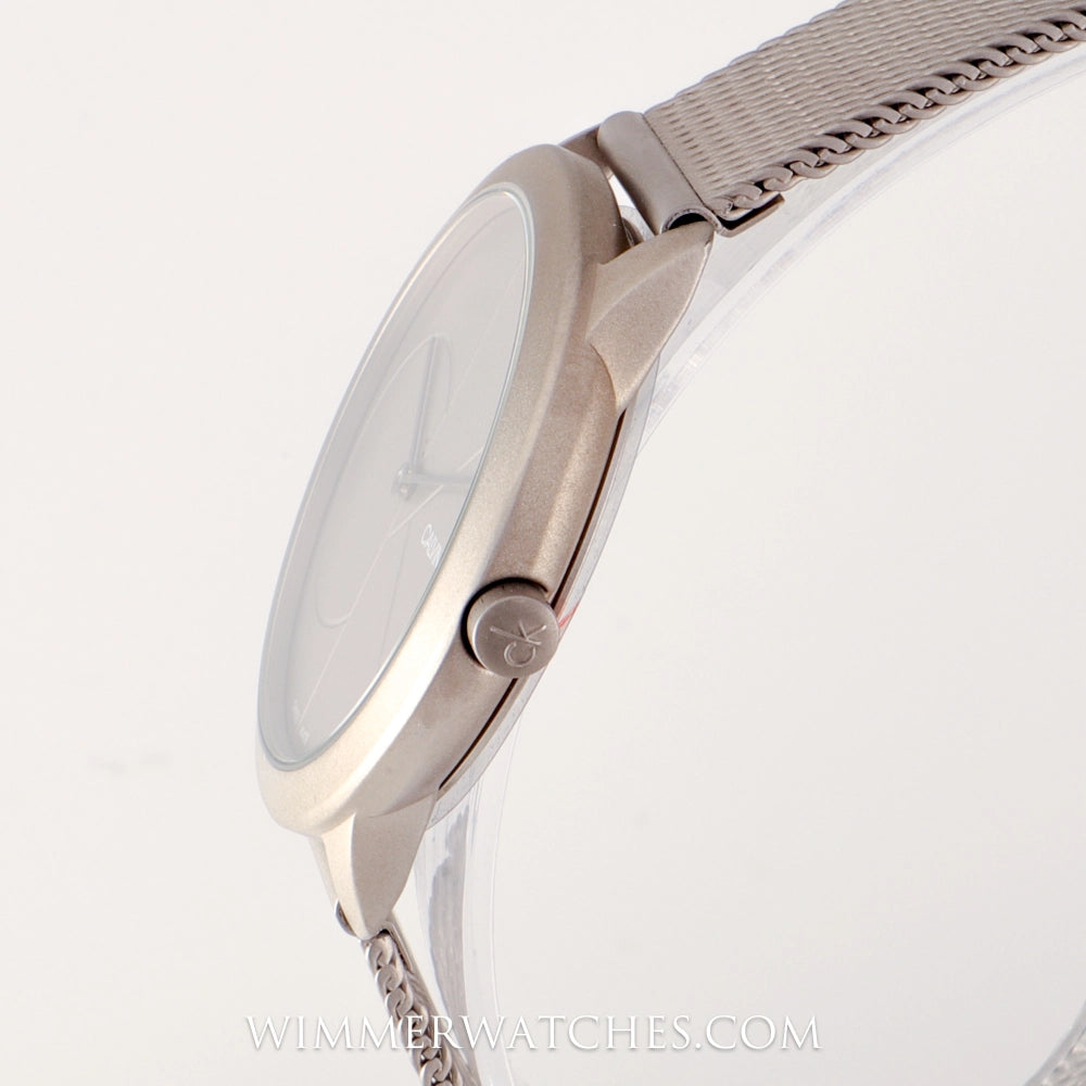 Side profile of Calvin Klein Minimal watch showing case thickness and mesh strap