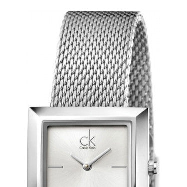 Calvin Klein K3R23126 watch face detail showing white dial and CK logo
