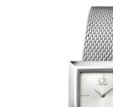 Calvin Klein K3R23126 dial close-up with CK logo and hour markers on white face