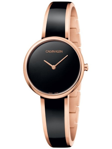 Calvin Klein Seduce watch front view showing black dial with rose gold case and two-tone strap