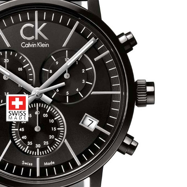 Close-up dial detail showing Swiss Made marking and chronograph subdials