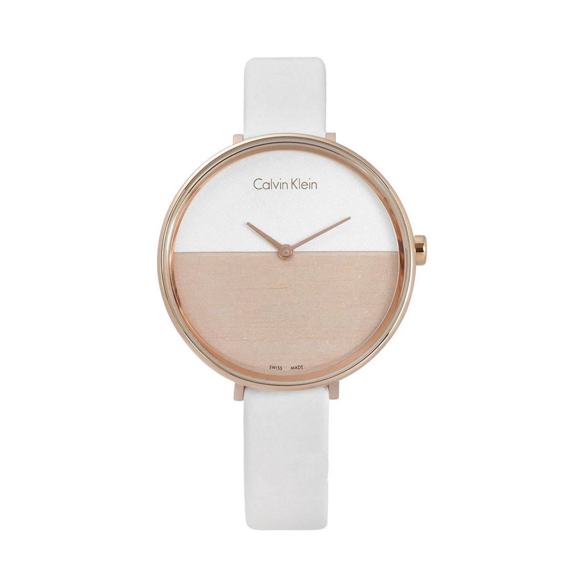 Calvin Klein K7A236LH women's watch with rose gold case, white strap, and wood-textured dial