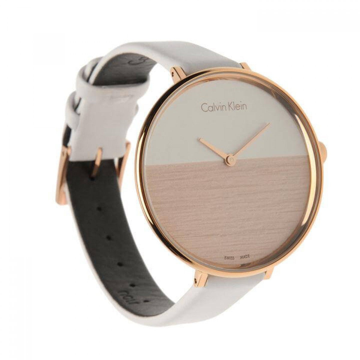 Calvin Klein K7A236LH women's watch on wrist with white leather strap and rose gold case