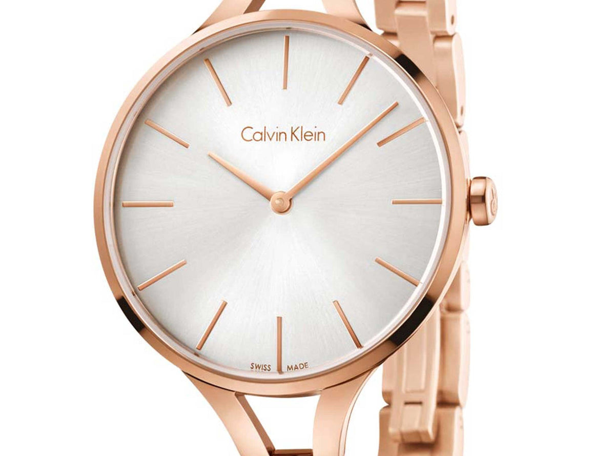 Three-quarter view of Calvin Klein K7E23646 watch with rose gold case and strap