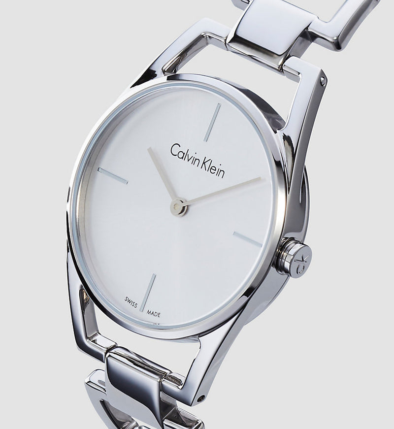 Angled view of Calvin Klein Dainty women's watch displaying dial and steel strap detail