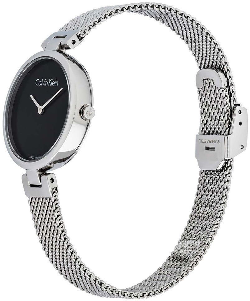 Calvin Klein K8G23121 black dial watch worn on wrist with silver mesh strap
