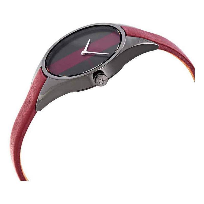 Calvin Klein Rebel ladies watch worn-style view with red strap detail