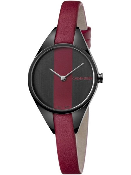 Calvin Klein Rebel watch featuring black case with red and black dial