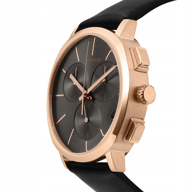 Side profile of Calvin Klein Posh watch showing rose gold case and black leather strap