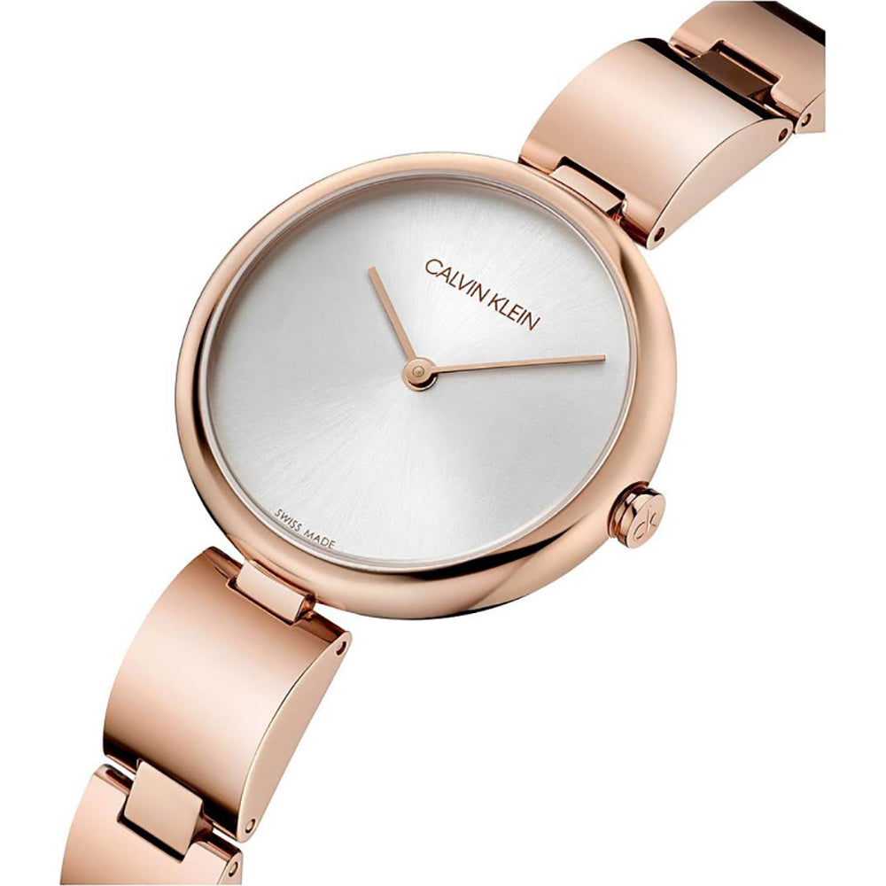 Calvin Klein rose gold women's watch worn on wrist