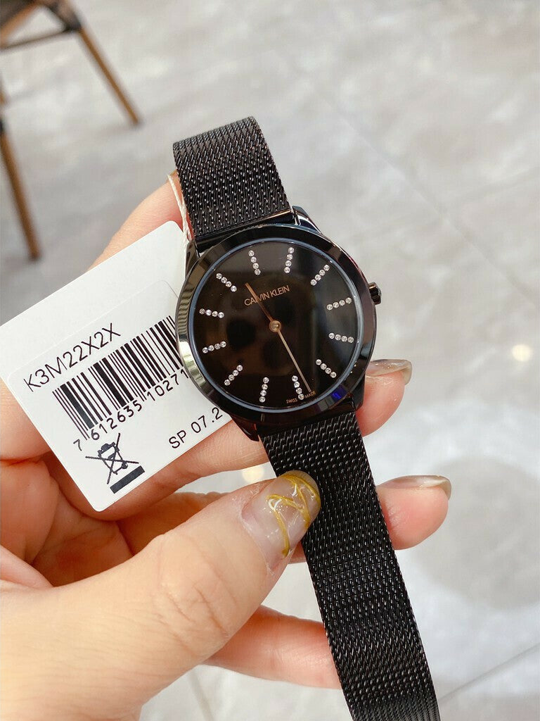 Calvin Klein Minimal Diamonds watch on wrist with tag visible
