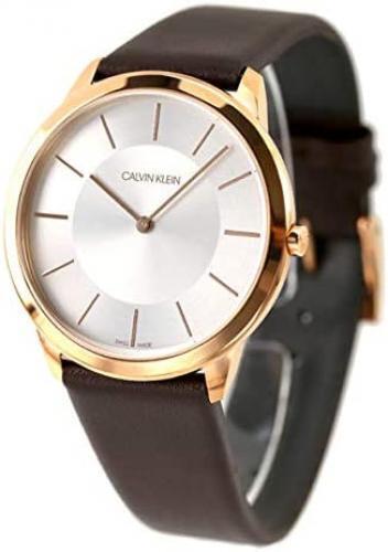 Angled view of Calvin Klein Minimal watch showing rose gold case profile and brown leather band