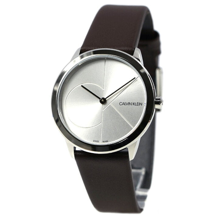 Calvin Klein Minimal K3M221G6 watch angled view showing brown leather strap and minimalist dial