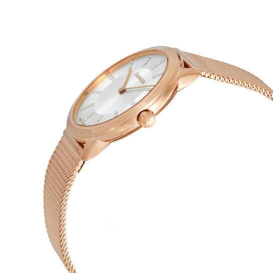 Side profile of Calvin Klein Minimal women's watch with silver dial and rose gold case