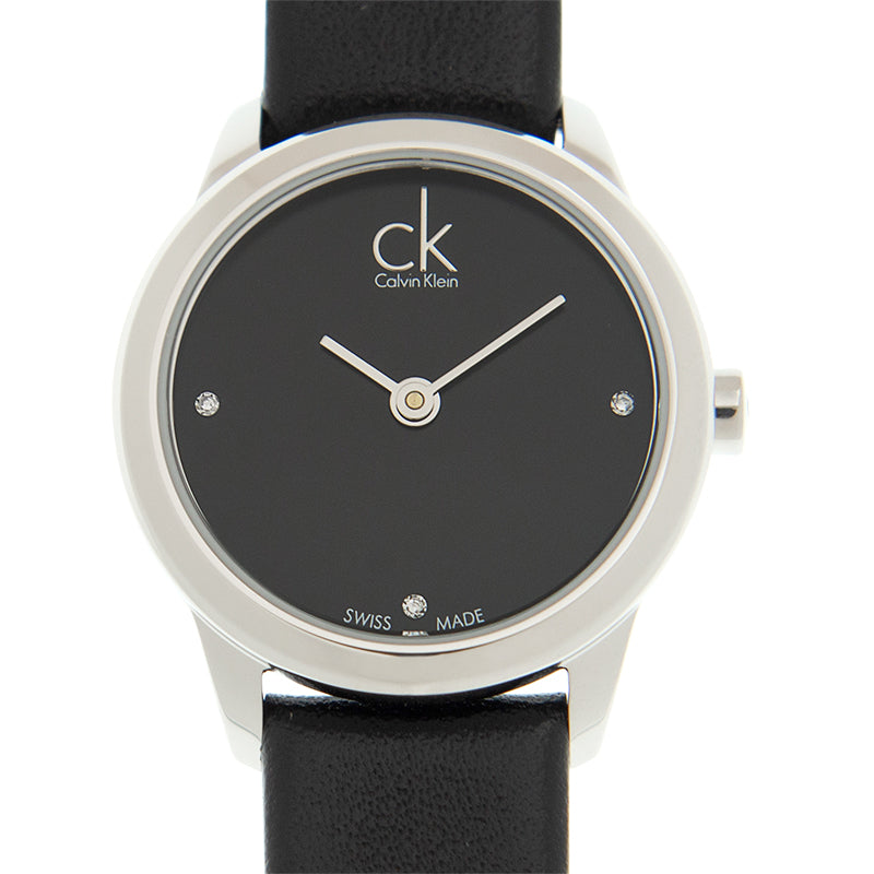 Dial detail of Calvin Klein Minimal K3M231CS showing black face and diamond indices