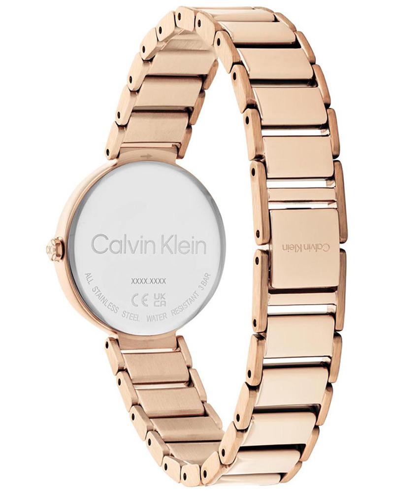 Case back of CALVIN KLEIN minimalistic watch showing stainless steel detail
