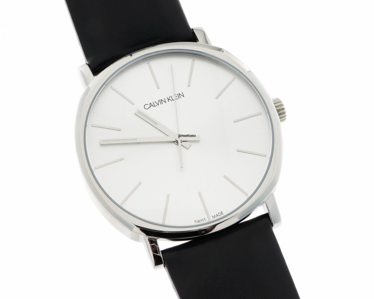 Calvin Klein Posh watch on wrist showing silver-tone case and black leather strap