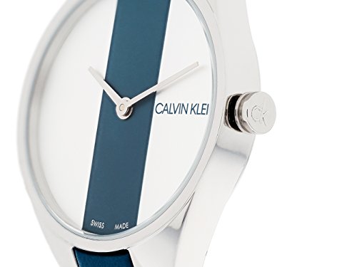 Calvin Klein Rebel watch dial detail showing navy vertical stripe and CALVIN KLEIN text